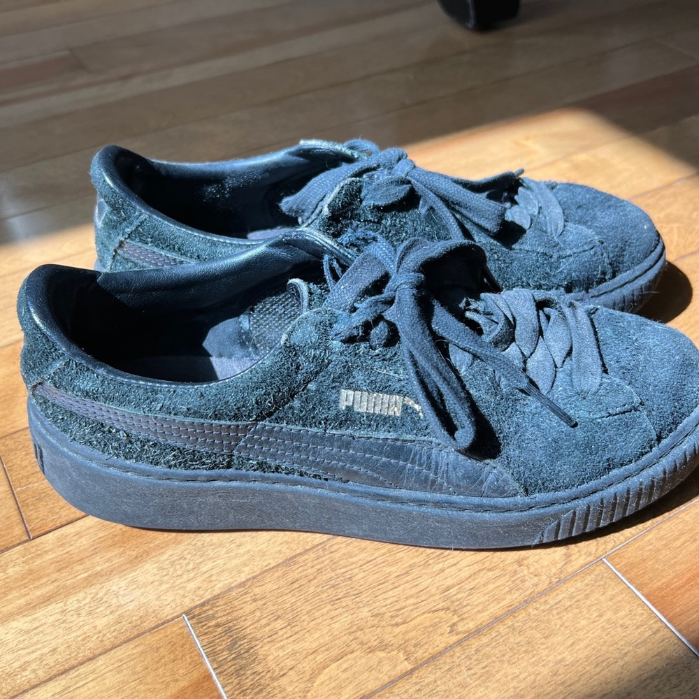 Puma black sneakers
